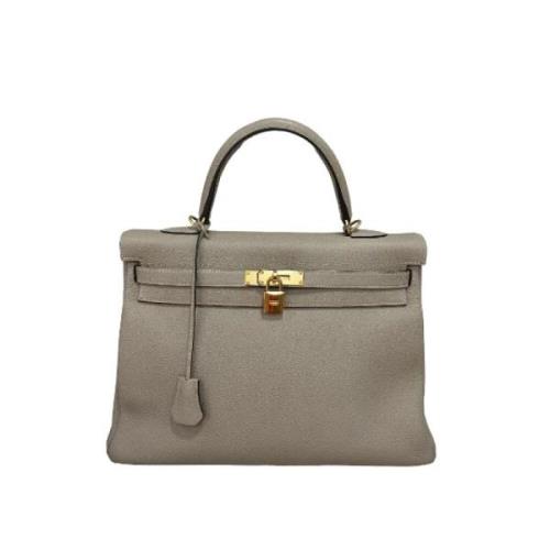 Pre-owned Leather handbags Hermès Vintage , Gray , Dames