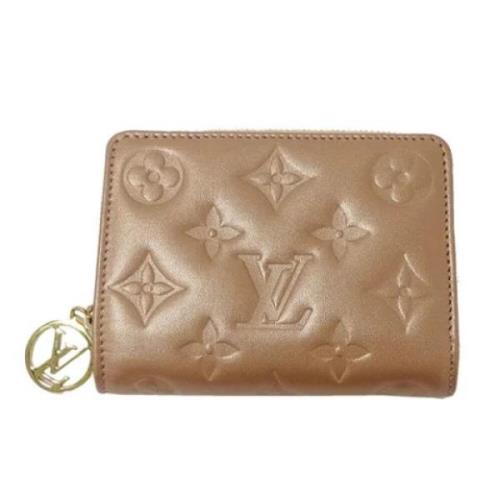 Pre-owned Coated canvas wallets Louis Vuitton Vintage , Pink , Dames