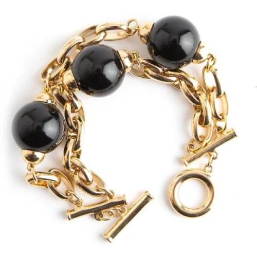Pre-owned Metal bracelets Givenchy Pre-owned , Yellow , Dames