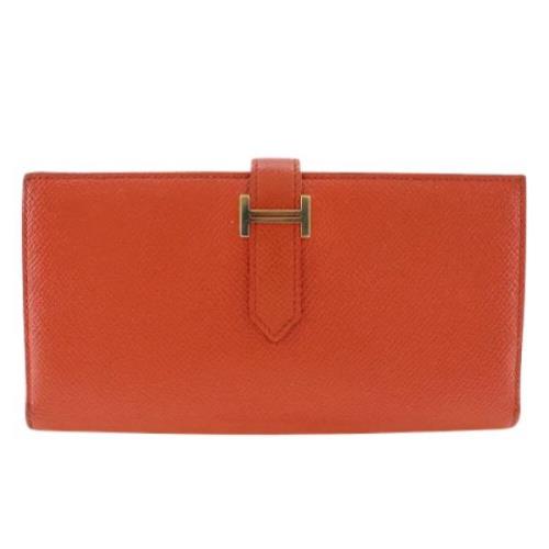 Pre-owned Leather wallets Hermès Vintage , Orange , Dames