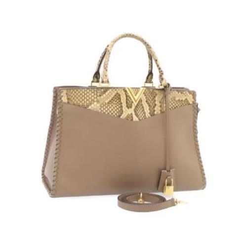 Pre-owned Leather handbags Louis Vuitton Vintage , Beige , Dames