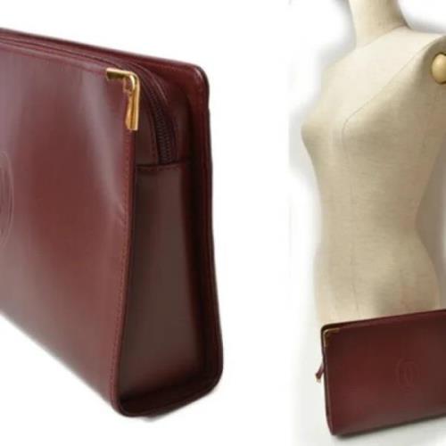 Pre-owned Leather clutches Cartier Vintage , Brown , Dames