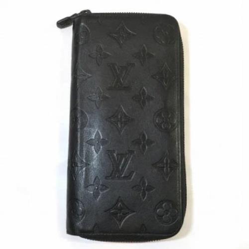 Pre-owned Leather wallets Louis Vuitton Vintage , Black , Dames