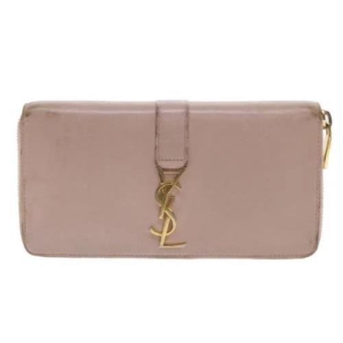 Pre-owned Leather wallets Yves Saint Laurent Vintage , Pink , Dames