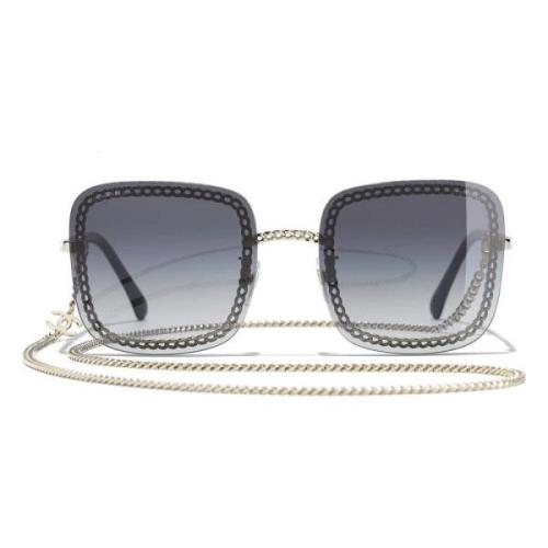 Stijlvolle zonnebril met zwart metalen montuur en degradatiefilter Cha...