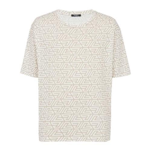 Oversized katoenen T-shirt met bedrukt piramide monogram Balmain , Bei...