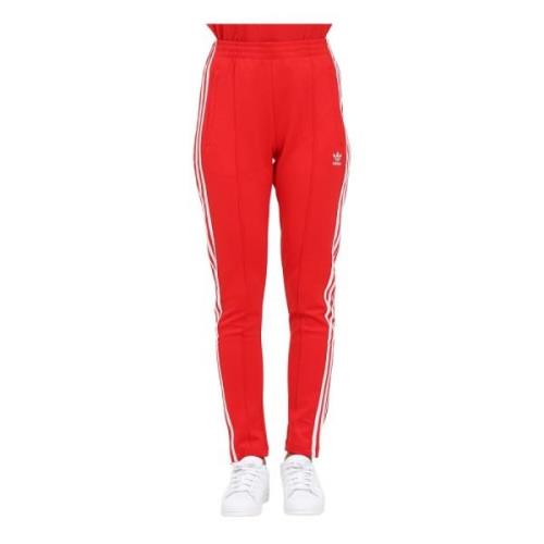 Lange rode broek voor dames met 3 strepen Adidas Originals , Red , Dam...