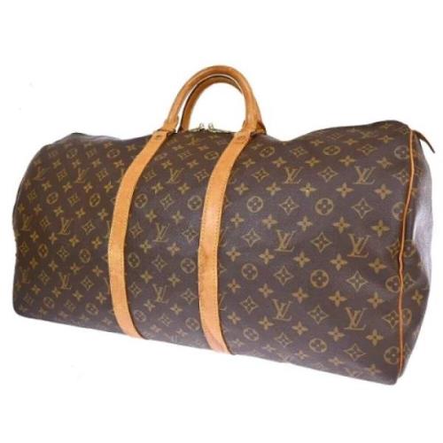 Pre-owned Canvas travel-bags Louis Vuitton Vintage , Brown , Dames