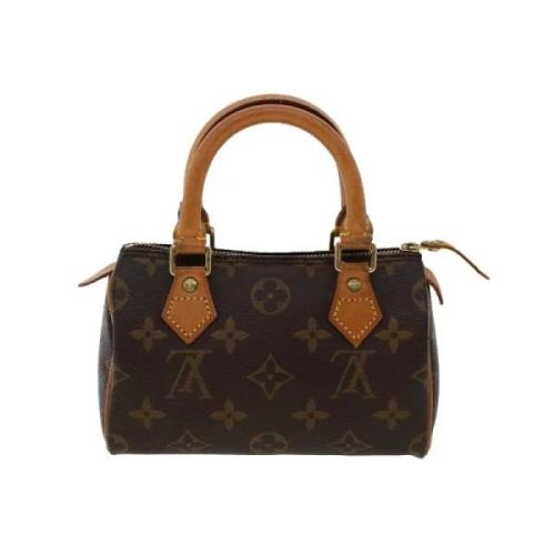 Pre-owned Canvas handbags Louis Vuitton Vintage , Brown , Dames