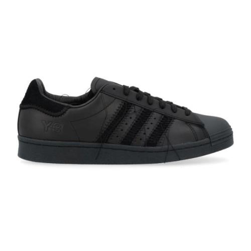 Zwarte leren Superstar sneaker met rafelige details Y-3 , Black , Here...