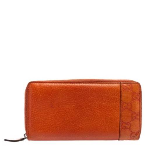 Pre-owned Leather wallets Gucci Vintage , Orange , Dames