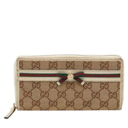 Pre-owned Canvas wallets Gucci Vintage , Beige , Dames