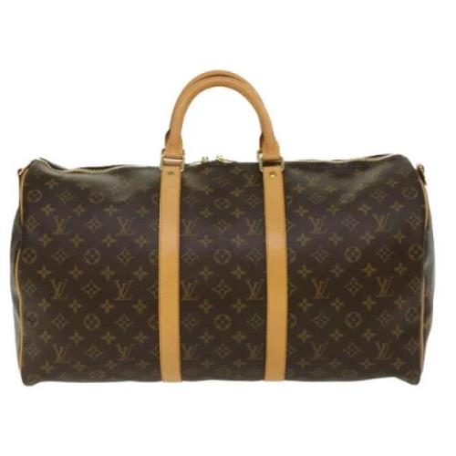 Pre-owned Canvas travel-bags Louis Vuitton Vintage , Brown , Dames