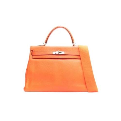 Pre-owned Leather crossbody-bags Hermès Vintage , Orange , Dames