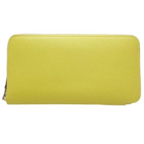 Pre-owned Leather wallets Hermès Vintage , Yellow , Dames