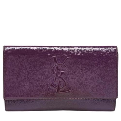 Pre-owned Leather clutches Yves Saint Laurent Vintage , Purple , Dames