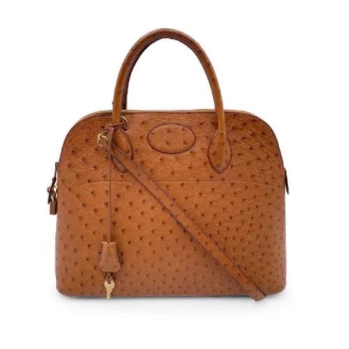 Pre-owned Leather handbags Hermès Vintage , Beige , Dames