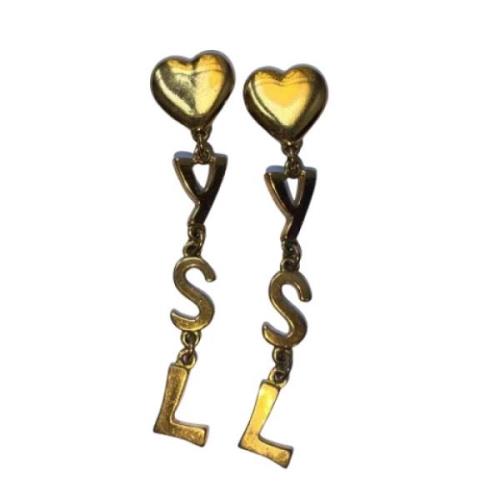 Pre-owned Metal earrings Yves Saint Laurent Vintage , Yellow , Dames