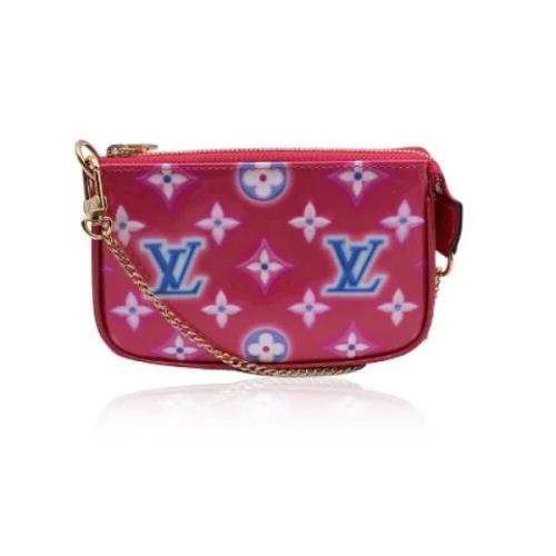 Pre-owned Leather clutches Louis Vuitton Vintage , Pink , Dames