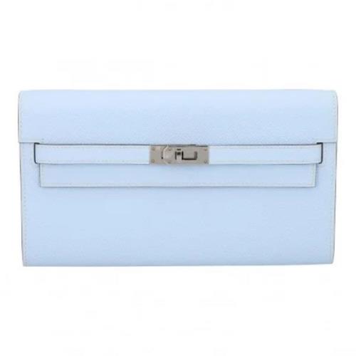 Pre-owned Leather clutches Hermès Vintage , Blue , Dames