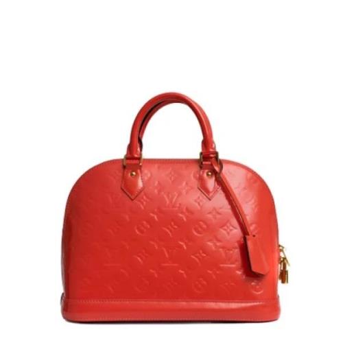 Pre-owned Leather handbags Louis Vuitton Vintage , Red , Dames