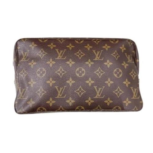 Pre-owned Leather clutches Louis Vuitton Vintage , Brown , Dames