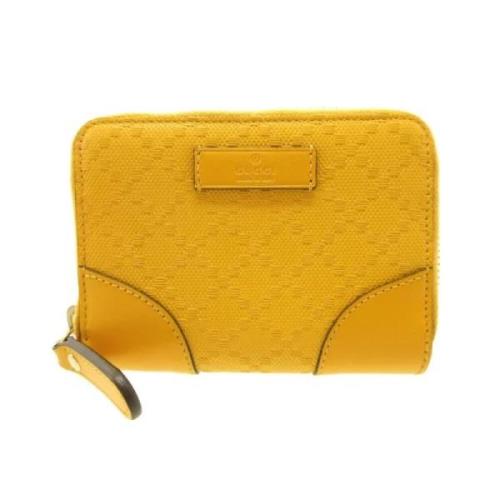 Pre-owned Canvas wallets Gucci Vintage , Yellow , Dames