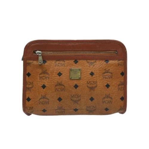 Pre-owned Canvas clutches MCM Pre-owned , Brown , Dames