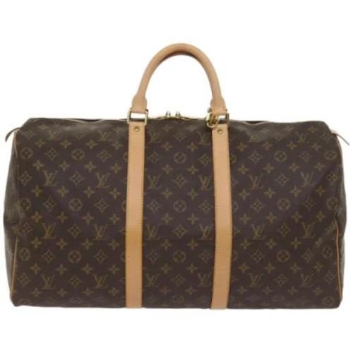 Pre-owned Canvas travel-bags Louis Vuitton Vintage , Brown , Dames