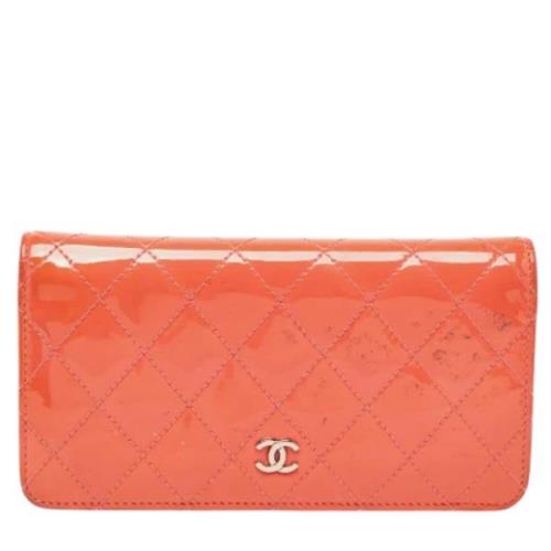 Pre-owned Leather wallets Chanel Vintage , Orange , Dames