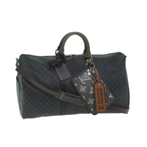 Pre-owned Coated canvas handbags Louis Vuitton Vintage , Black , Dames