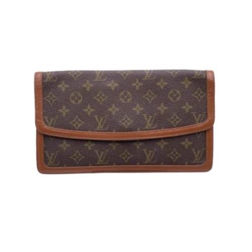 Pre-owned Leather clutches Louis Vuitton Vintage , Brown , Dames