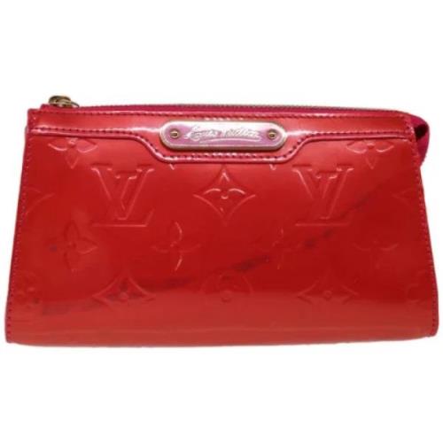 Pre-owned Leather clutches Louis Vuitton Vintage , Pink , Dames