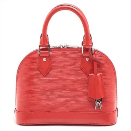 Pre-owned Leather handbags Louis Vuitton Vintage , Red , Dames