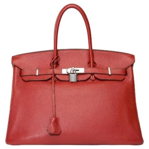 Pre-owned Leather handbags Hermès Vintage , Red , Dames