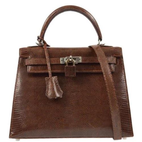 Pre-owned Canvas handbags Hermès Vintage , Brown , Dames