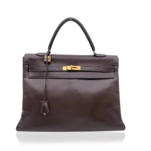 Pre-owned Leather handbags Hermès Vintage , Brown , Dames