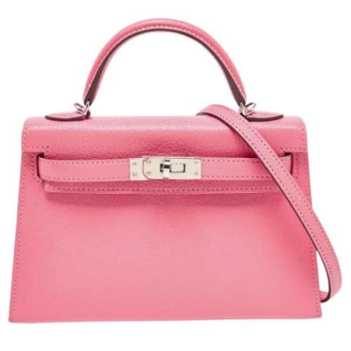 Pre-owned Leather handbags Hermès Vintage , Pink , Dames