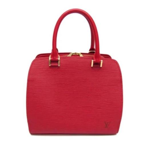 Pre-owned Leather handbags Louis Vuitton Vintage , Red , Dames