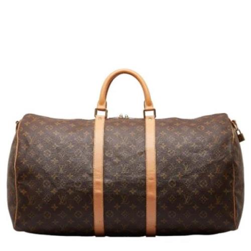 Pre-owned Canvas handbags Louis Vuitton Vintage , Brown , Dames