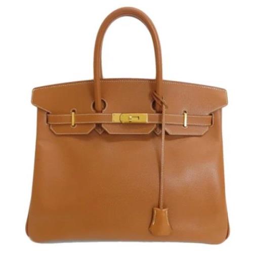 Pre-owned Leather handbags Hermès Vintage , Brown , Dames