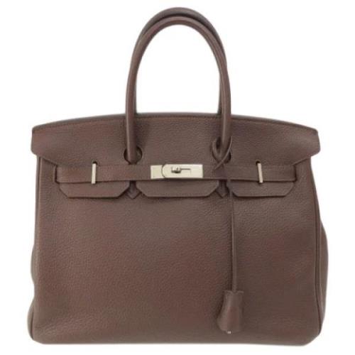 Pre-owned Leather handbags Hermès Vintage , Brown , Dames