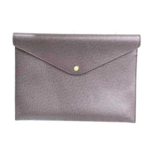 Pre-owned Leather clutches Louis Vuitton Vintage , Purple , Dames