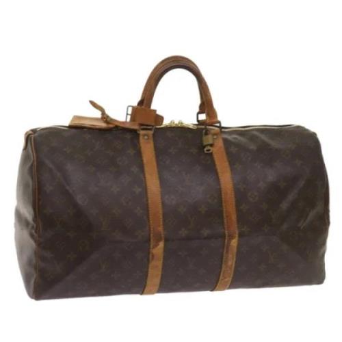 Pre-owned Canvas handbags Louis Vuitton Vintage , Brown , Dames