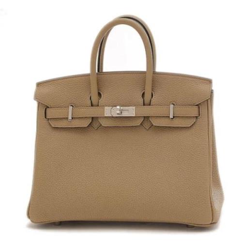 Pre-owned Leather handbags Hermès Vintage , Beige , Dames