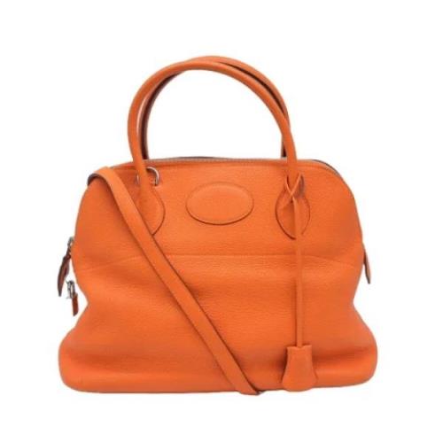 Pre-owned Leather handbags Hermès Vintage , Orange , Dames