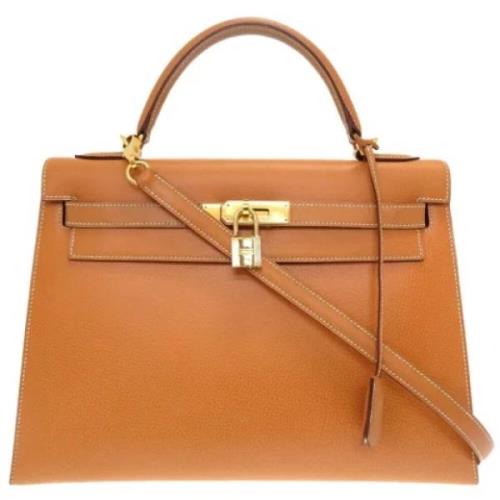 Pre-owned Leather handbags Hermès Vintage , Brown , Dames