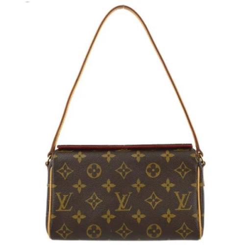 Pre-owned Leather handbags Louis Vuitton Vintage , Brown , Dames