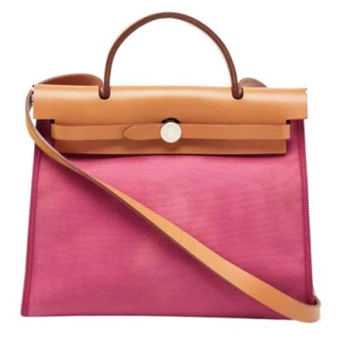 Pre-owned Canvas handbags Hermès Vintage , Pink , Dames
