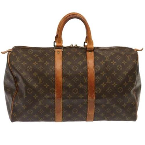 Pre-owned Canvas travel-bags Louis Vuitton Vintage , Brown , Dames